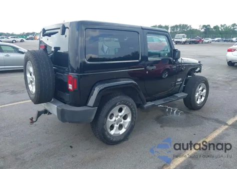 2015 Jeep Wrangler Sahara z USA, uszkodzony, nr VIN 1C4AJWBG4FL605659
